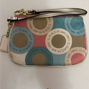 Coach Blue and Tan Circle Pattern Wristlet